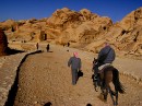 Riding into Petra * Jim on the trail to Petra.  This first kilometer you ride by horse, then you must walk for the next kilometer to main site. Once there, you can then rent a donkey or camel to continue (or walk as we did). * 576 x 431 * (113KB)